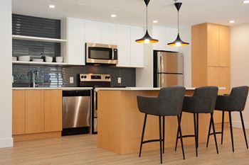 Surrey Village social room featuring catering kitchen in Surrey, BC